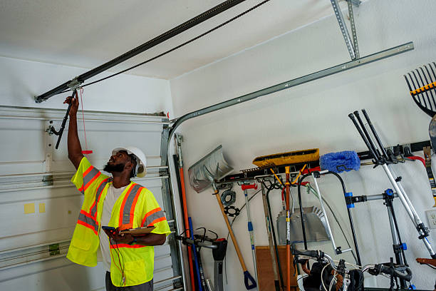 Professional Garage Door technician working in Groves, TX